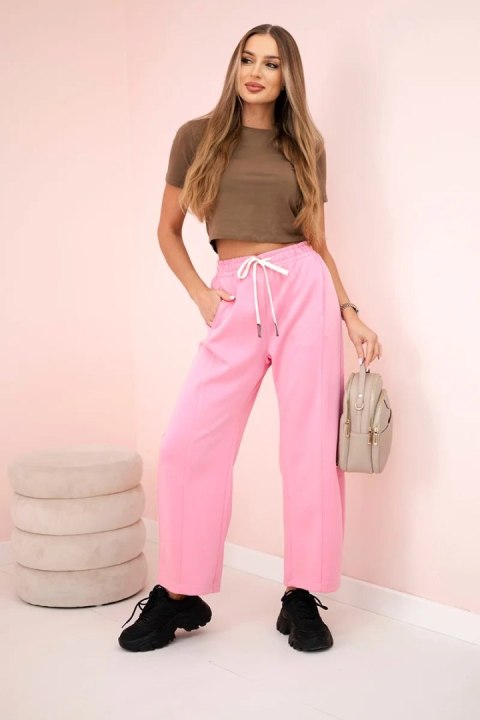 Spodnie masełko wiązane w pasie różowe