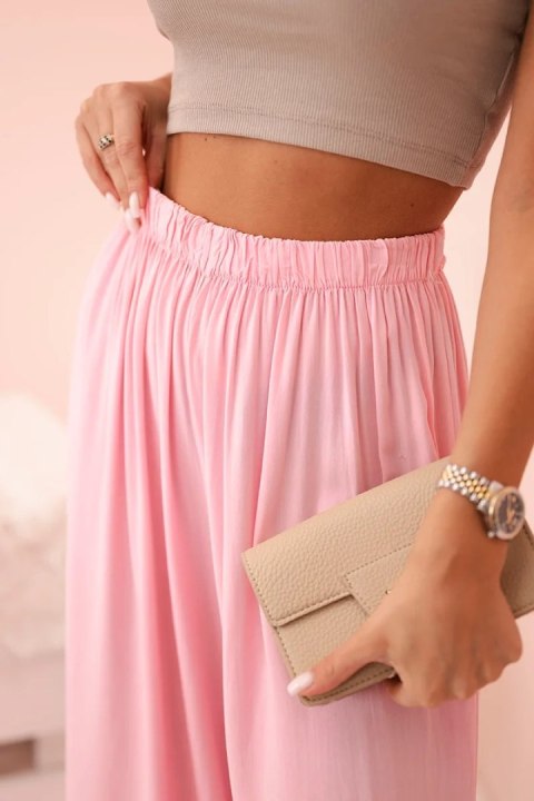 Spodnie damskie szerokie z gumką w pasie jasno różowe