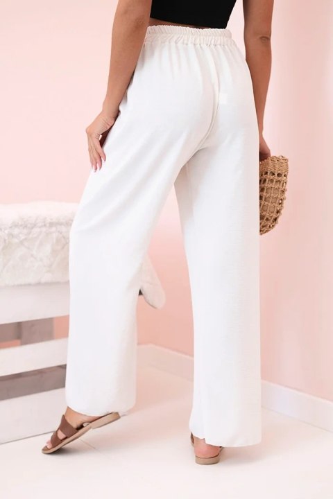 Spodnie z szeroką nogawką jasno beżowe