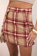 Spódniczka damska na szelkach w kratę z guzikami beżowa