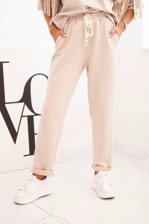 Komplet damski masełkowy z frędzlami na rękawach beżowy