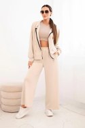 Komplet damski masełko z szeroką nogawką i bluzą na zamek beżowy