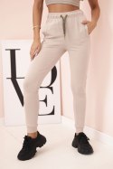 Spodnie dresowe damskie z kieszeniami i wiązaniem w pasie beżowe