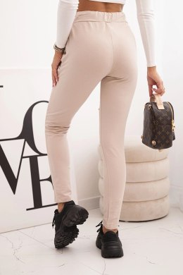 Spodnie damskie bawełniane z przetarciami i gumką w pasie beżowe