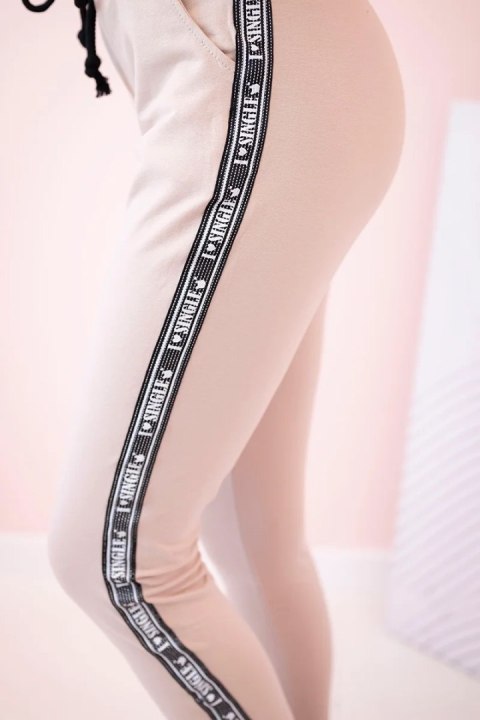 Spodnie damskie dresowe z lampasem i wiązaniem w pasie beżowe