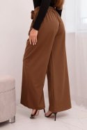 Spodnie damskie eleganckie z szeroką nogawką i ozdobnym kwiatem jasno brązowe