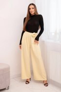 Spodnie damskie eleganckie z szeroką nogawką i ozdobnym kwiatem żółte